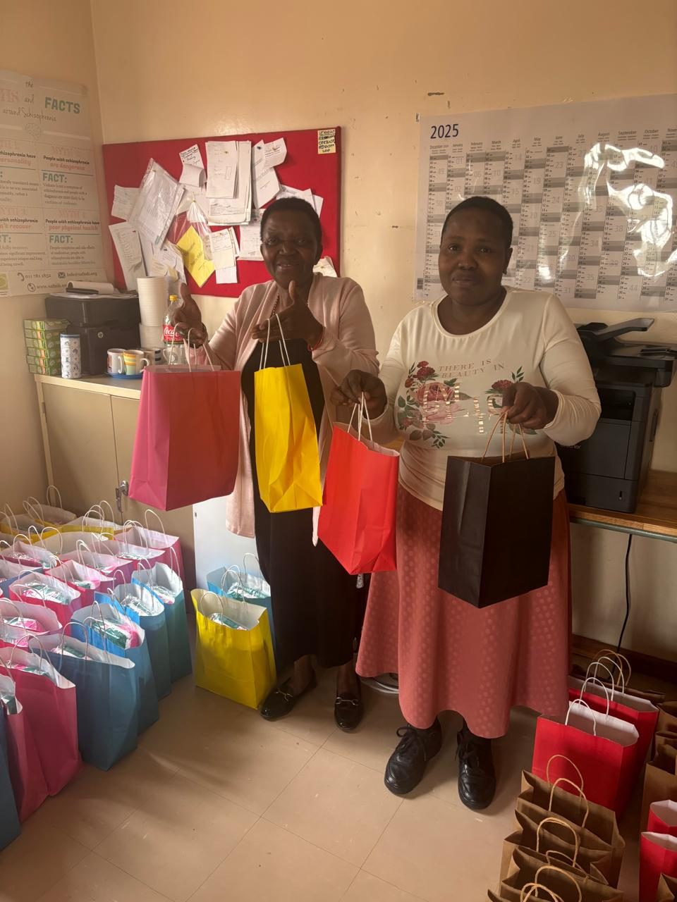 Staff at Egodeni Care Centre packing gift bags for the children